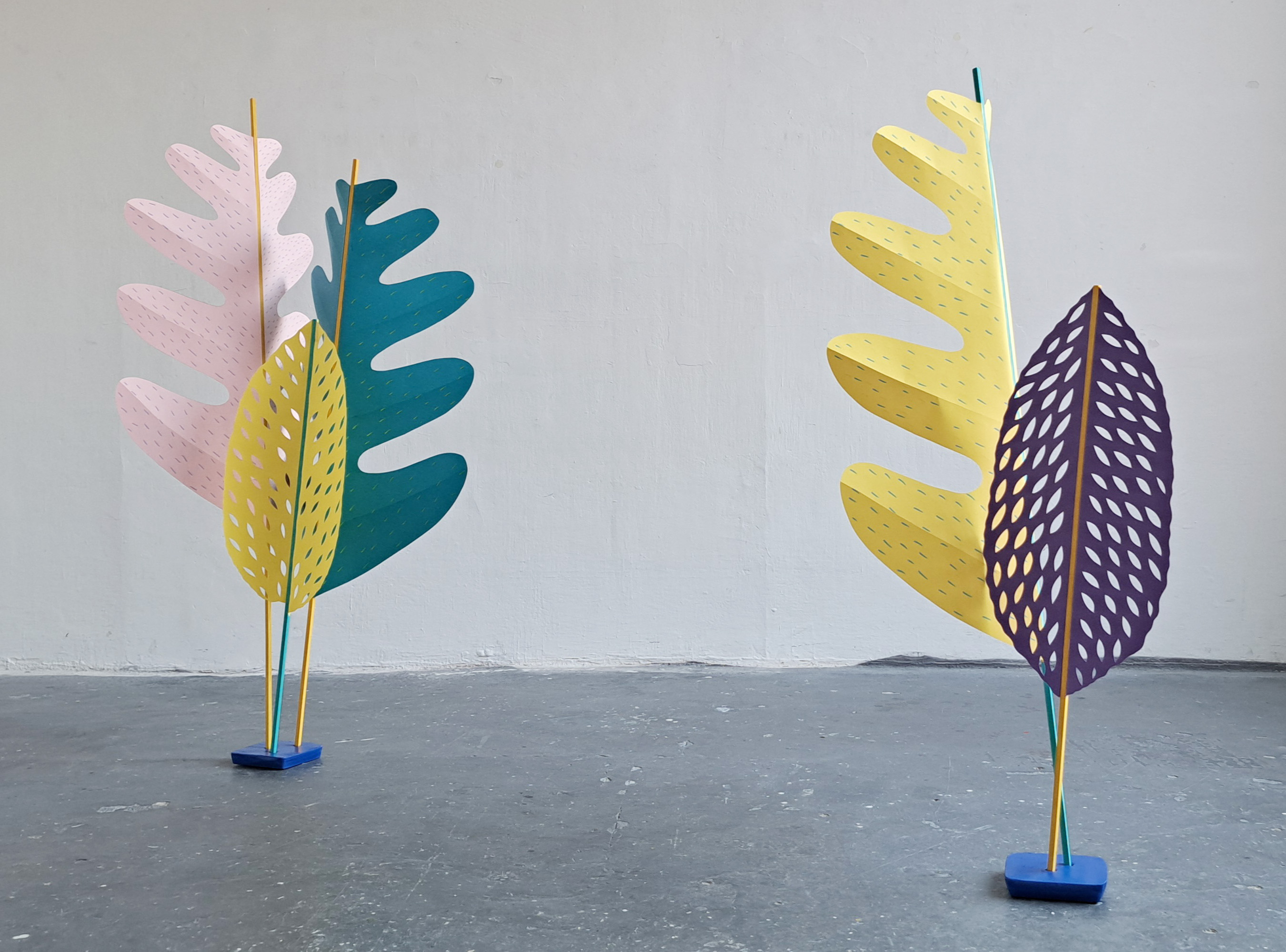 hight Paper sculptures. Simulate plants. Bright colours. 