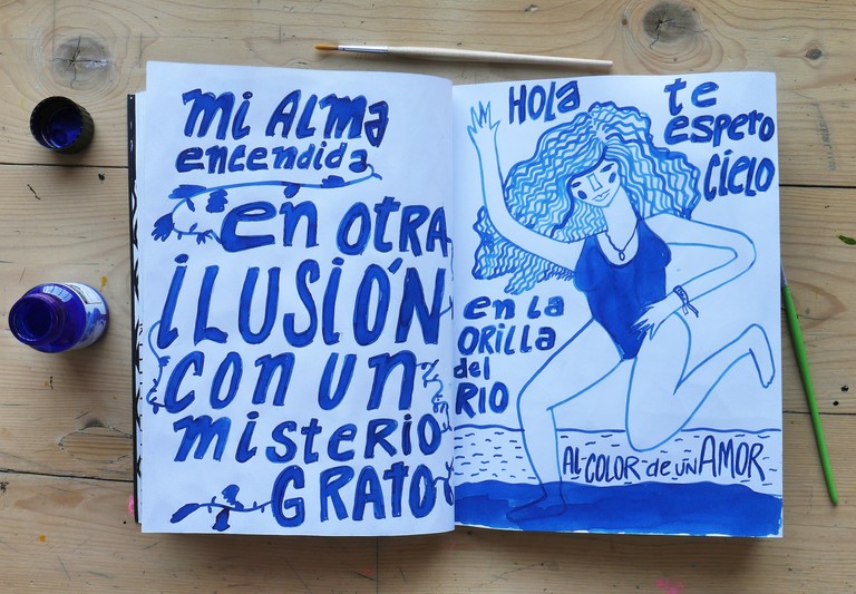 Blue ink drawing on paper