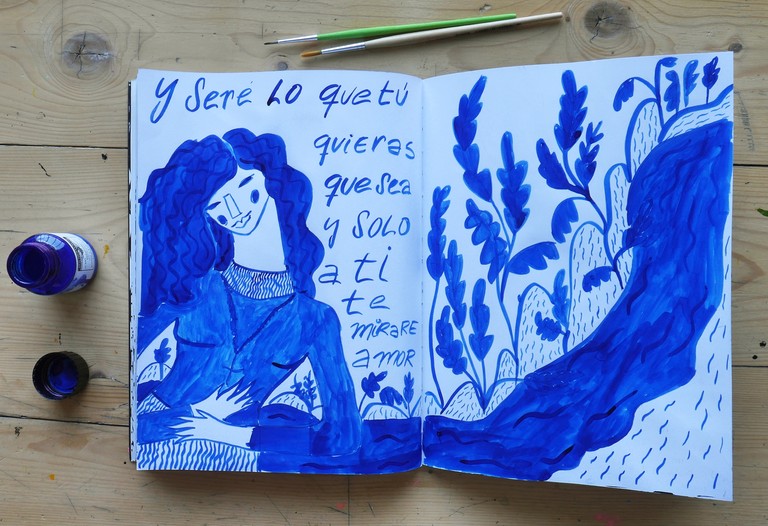 Blue ink drawing on paper