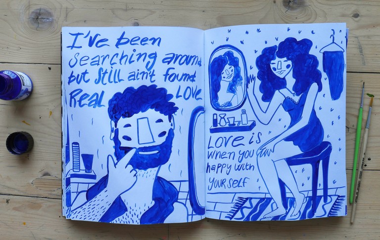 Blue ink drawing on paper